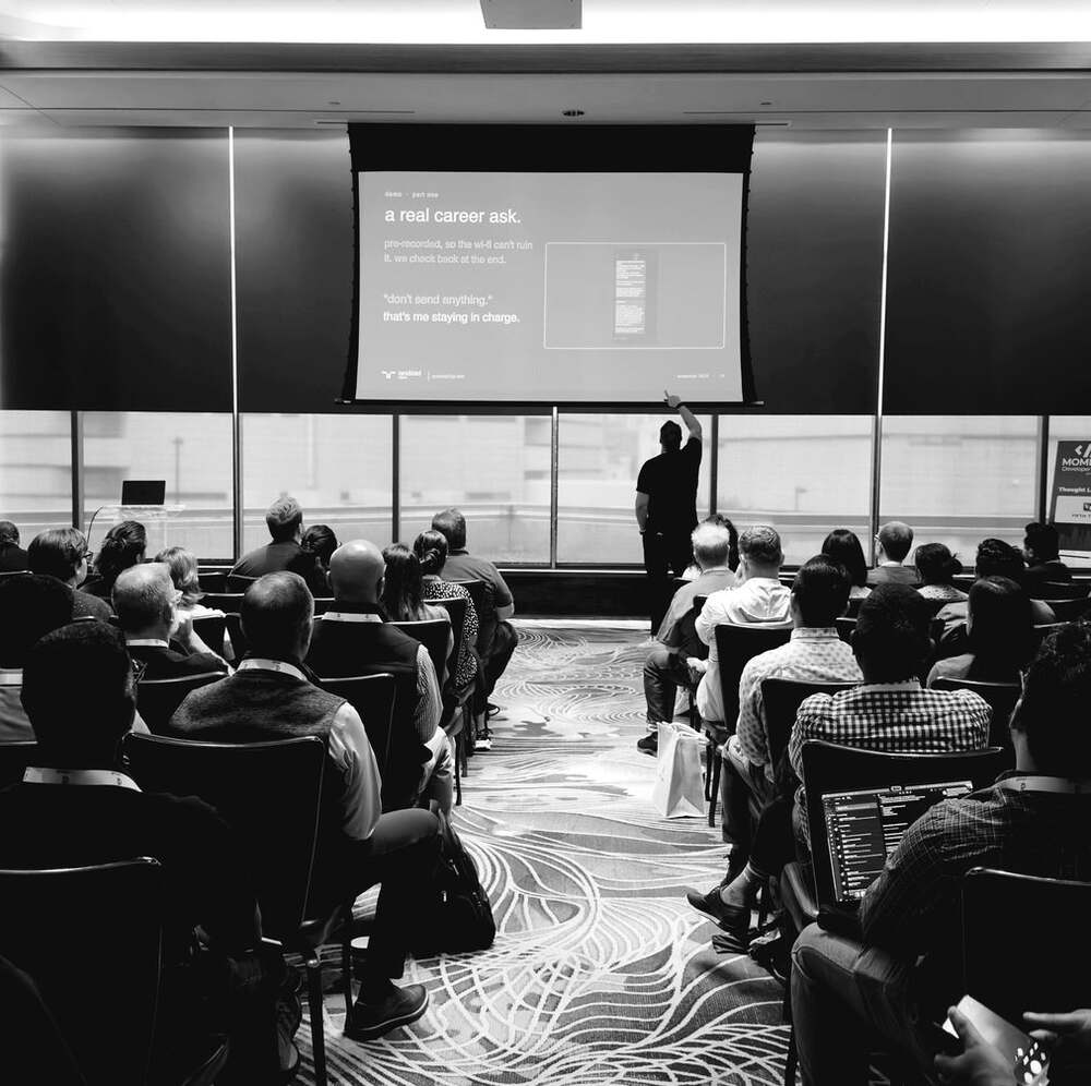 a packed developer meetup room